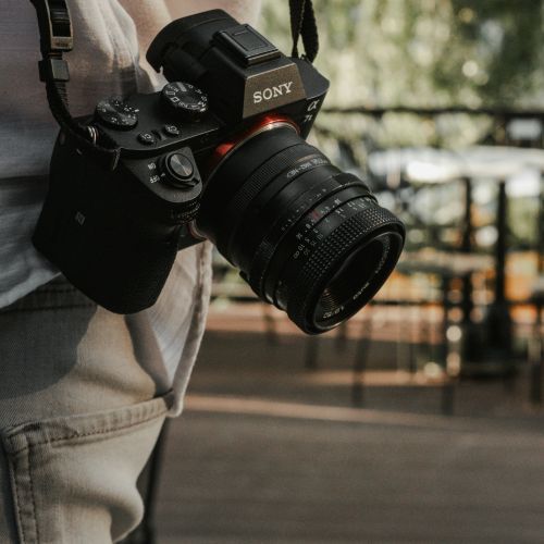 Sony camera hung on person