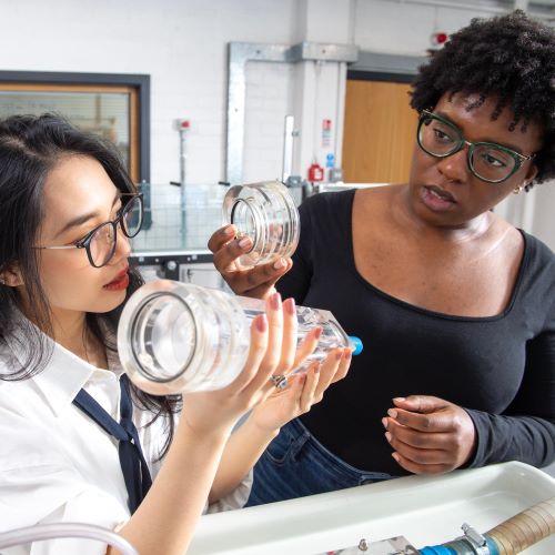 two women engineers in a lab