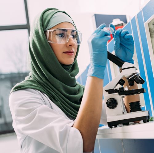 woman at microscope