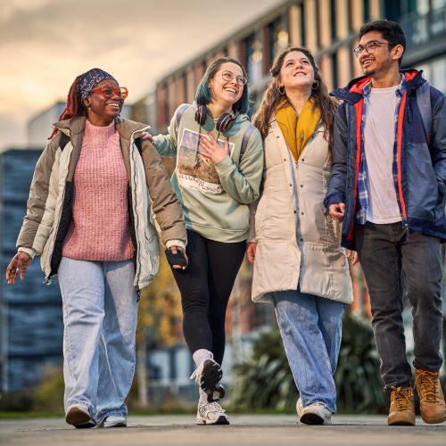 four research students walking together