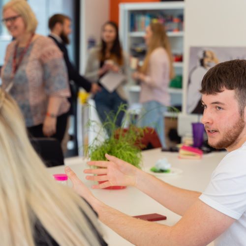 People networking in Bright Red Triangle entrepreneurship lab 