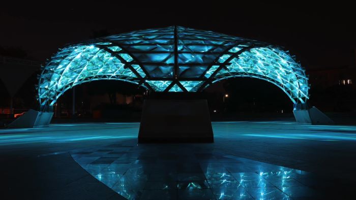 Lit up bamboo-timber gridshell structure in China
