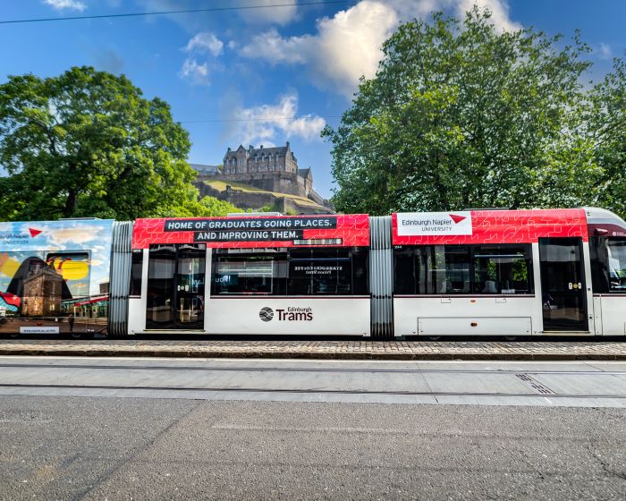 Edinburgh tram with castle in background